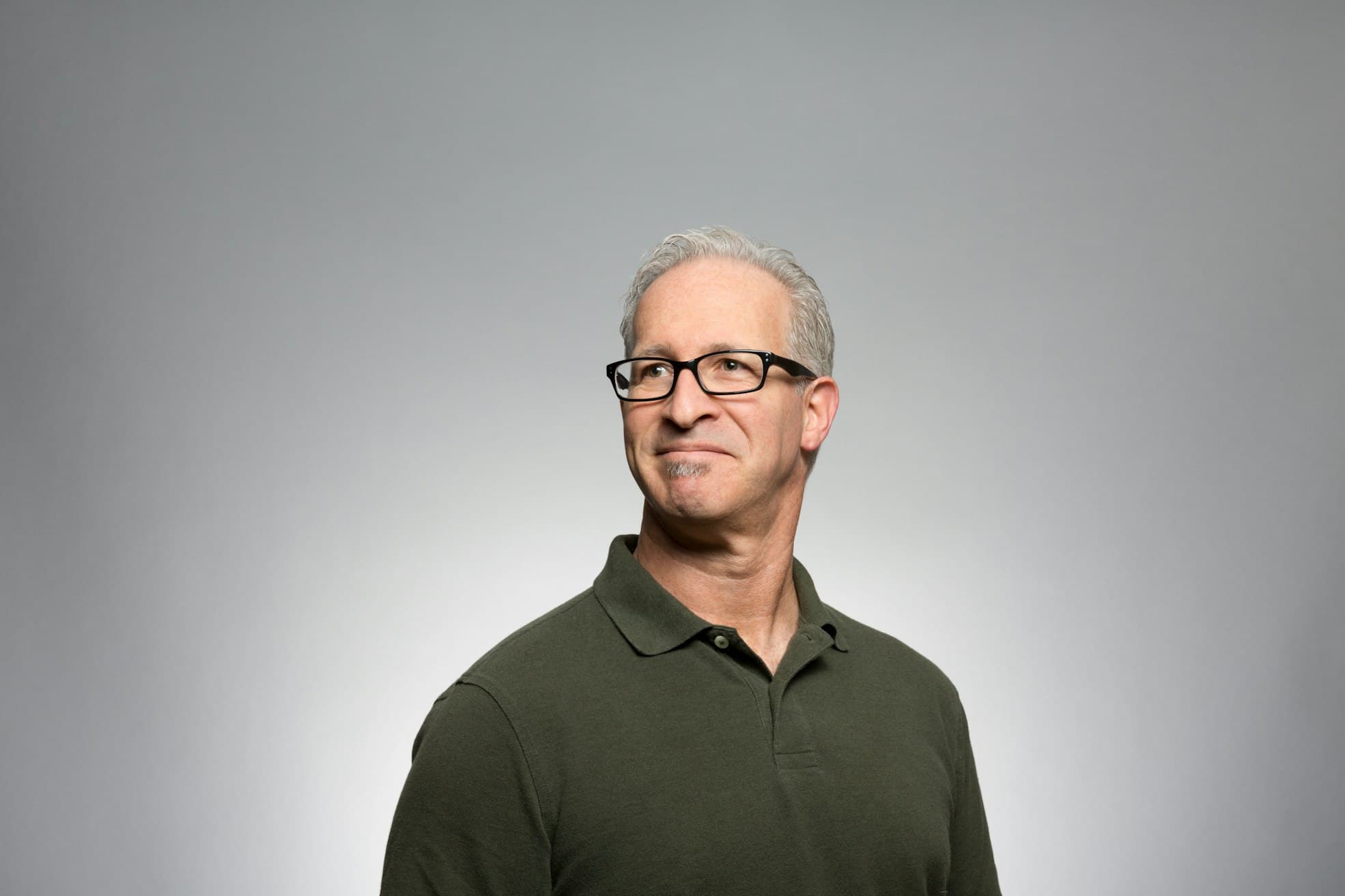 Headshot portrait of property investor David Chen wearing glasses